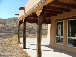 back portal of a Pueblo-style house
