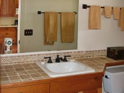 bathroom counter with custom tile