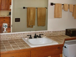 bathroom counter with custom tile