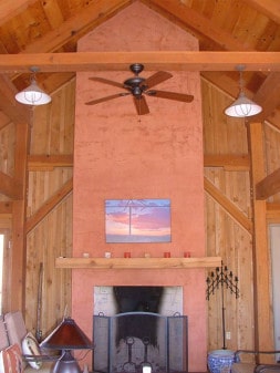 timber frame fireplace with Venetian plaster