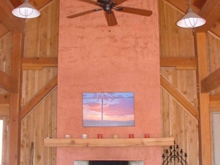 timber frame fireplace with Venetian plaster