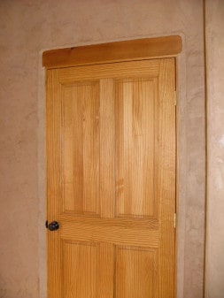 Venetian plaster and wooden door